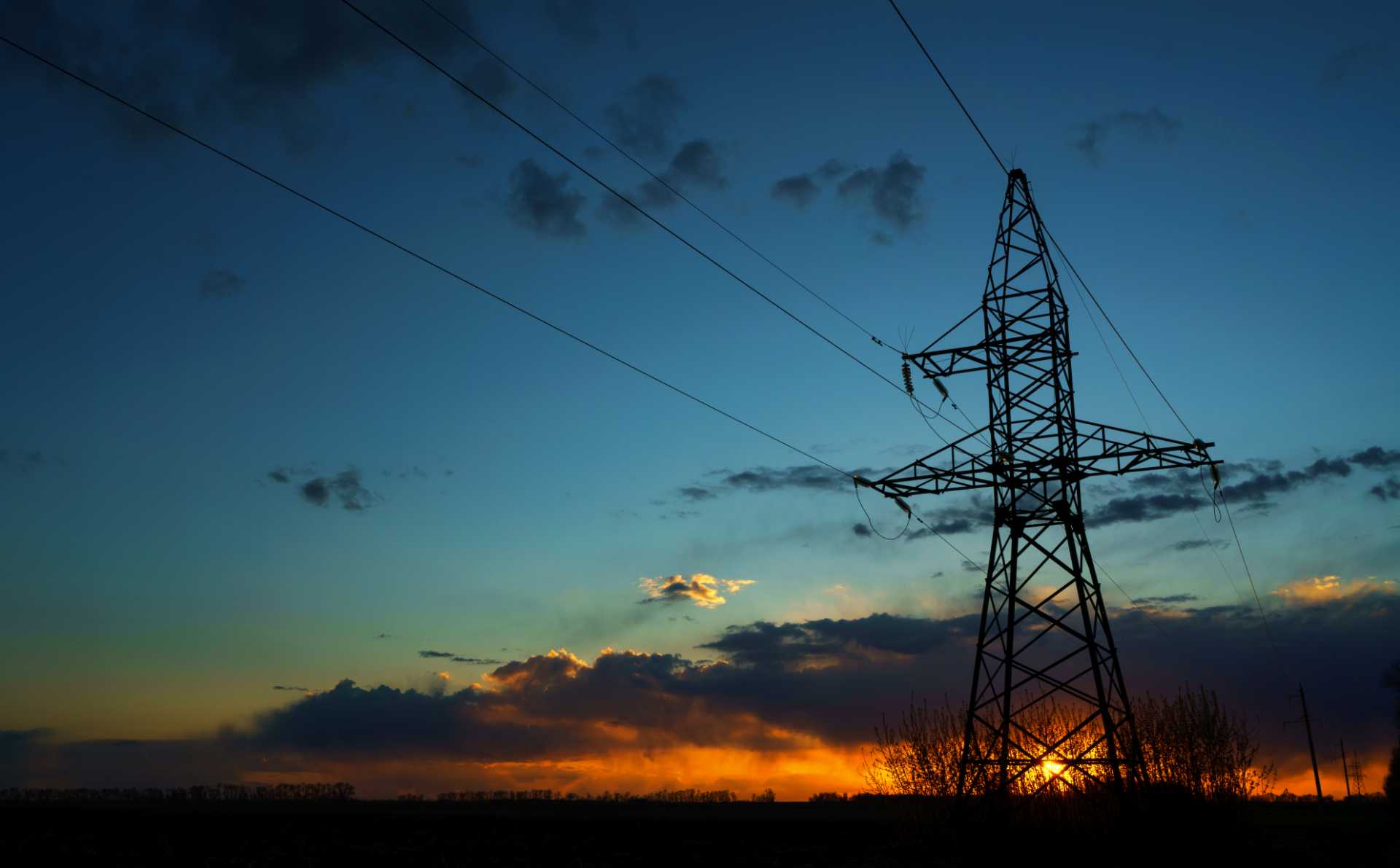 power-lines-against-the-sky-at-sunset-PE8LP77 (1)